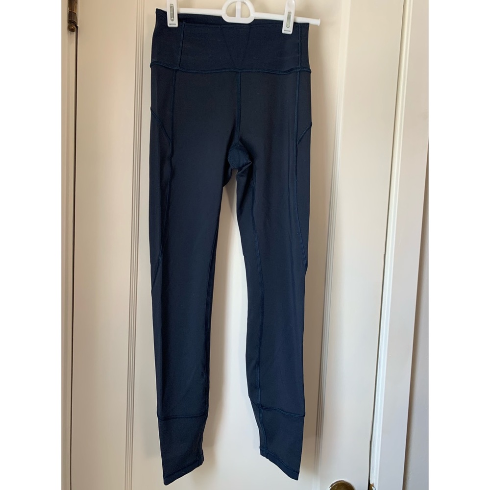 Lulu Lemon in movement tight leggings.